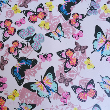 Кожзам разноцветные бабочки на бледно розовом 30 х 70 см